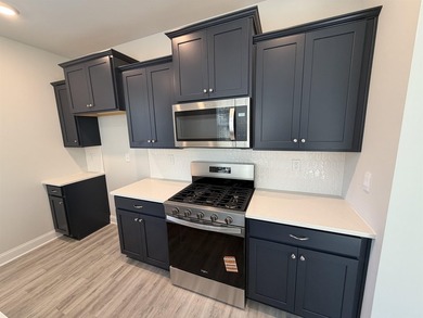 This home in the gated neighborhood of Waterbridge is brand new - photo 11
