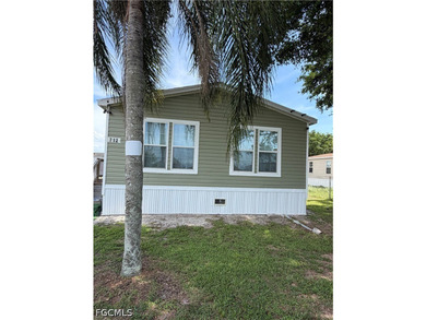 Welcome Home! Beautiful 2023 double-wide manufactured home is - photo 1
