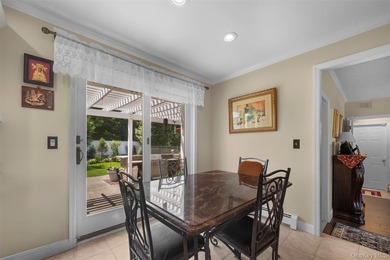 Exquisite custom-built Colonial elegantly positioned midblock on - photo 11