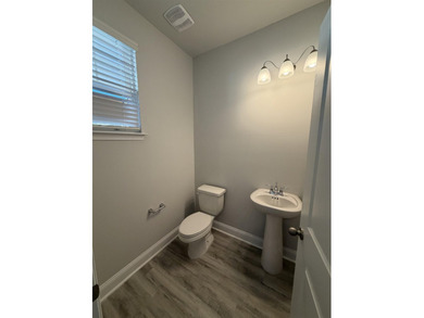 This home in the gated neighborhood of Waterbridge is brand new - photo 12