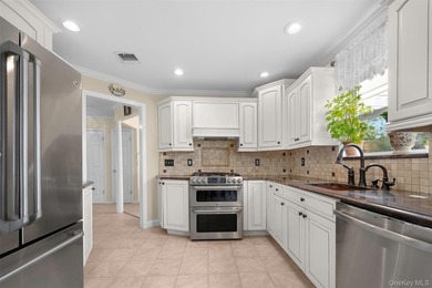 Exquisite custom-built Colonial elegantly positioned midblock on - photo 12
