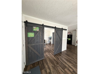 Welcome Home! Beautiful 2023 double-wide manufactured home is - photo 3