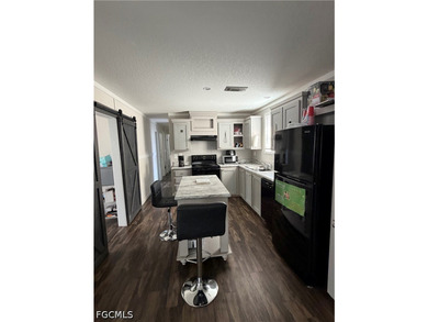 Welcome Home! Beautiful 2023 double-wide manufactured home is - photo 5