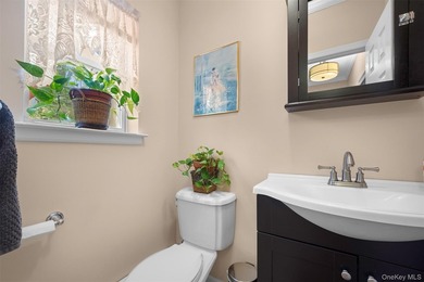 Exquisite custom-built Colonial elegantly positioned midblock on - photo 15