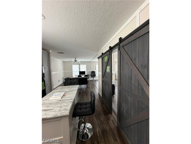 Welcome Home! Beautiful 2023 double-wide manufactured home is - photo 6