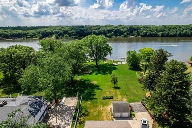 Spectacular Rock River location! This wonderful home offers 75 - photo 3