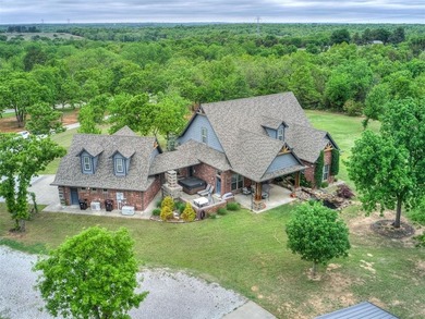 Nestled on approximately 4 private, wooded acres, this - photo 4