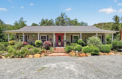 Picturesque Creekfront Farmhouse on 5.03 fully fenced acres! - photo 1