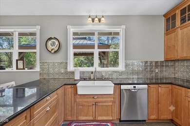 Picturesque Creekfront Farmhouse on 5.03 fully fenced acres! - photo 9