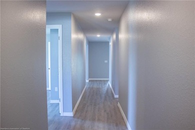 Welcome to this 4-bedroom, 2-bathroom home, perfect for families - photo 4