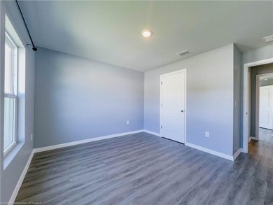 Welcome to this 4-bedroom, 2-bathroom home, perfect for families - photo 6