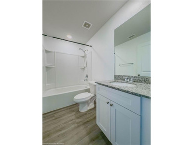 Welcome to this 4-bedroom, 2-bathroom home, perfect for families - photo 7