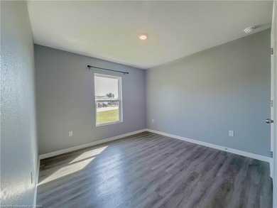 Welcome to this 4-bedroom, 2-bathroom home, perfect for families - photo 8