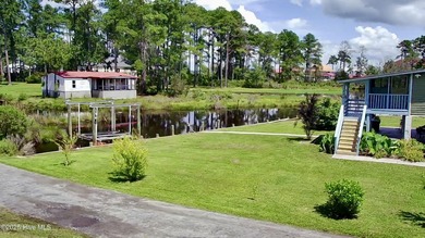 This waterfront bungalow is the perfect getaway located on a - photo 8