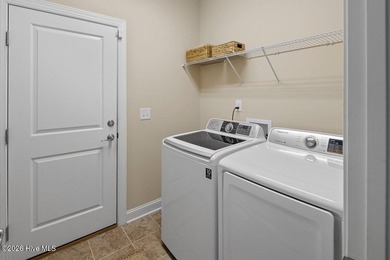 A pristine three-bedroom townhouse in the Cypress Creek - photo 12