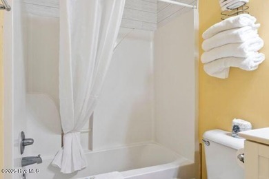 Experience coastal living at its finest with this stunning