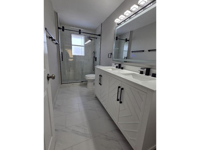 Beautiful 4-bedroom, 2.5-bath two-story lakefront home with a - photo 22