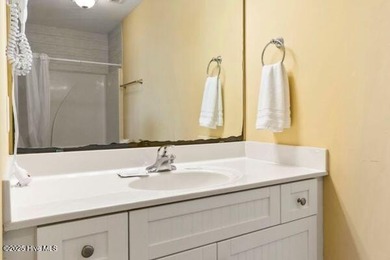 Experience coastal living at its finest with this stunning