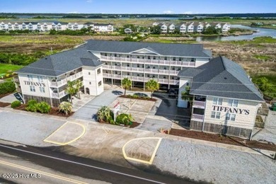 Experience coastal living at its finest with this stunning