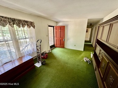 Here is your opportunity to own a brick ranch home in the - photo 3