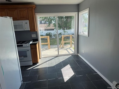 Beautiful Updated Split-Level Home on a Prime Corner Lot Welcome - photo 5