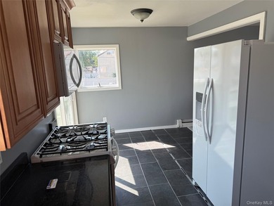 Beautiful Updated Split-Level Home on a Prime Corner Lot Welcome - photo 7