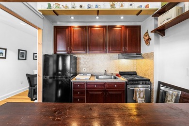 Experience the perfect blend of space and vibrant city living in - photo 8