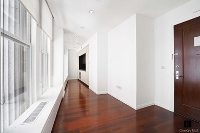 Welcome home to this glamorous corner One Bedroom apartment at - photo 7
