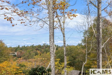 Nestled within the gates of Wildcat Cliffs Country Club but part