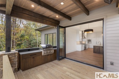 Nestled within the gates of Wildcat Cliffs Country Club but part