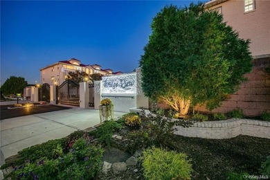 LUXURY WATERFRONT Mediterranean Villa-style 2-Family home in an - photo 4