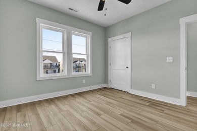 Brand-New Soundfront Construction in Surf City! This fully