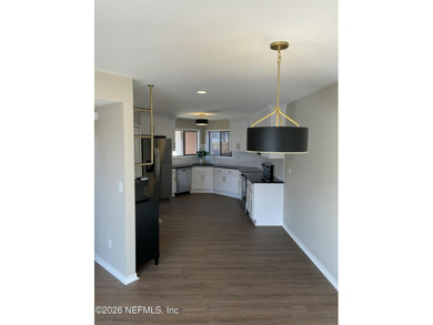 Step into 1159 Romaine Circle E, a fully renovated - photo 2