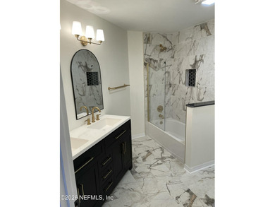 Step into 1159 Romaine Circle E, a fully renovated - photo 3