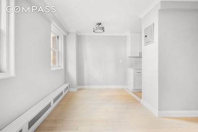 Welcome to Unit 12L, soon to be newly renovated, high-floor - photo 5