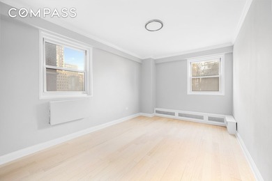 Welcome to Unit 12L, soon to be newly renovated, high-floor - photo 6