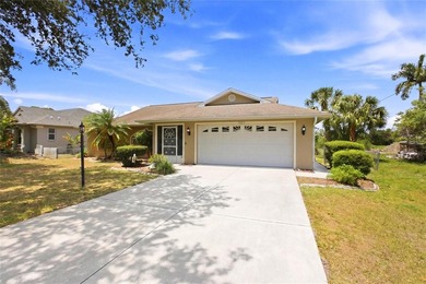 Tucked into a quiet North Port neighborhood, this well loved and - photo 2