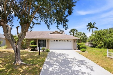 Tucked into a quiet North Port neighborhood, this well loved and - photo 3