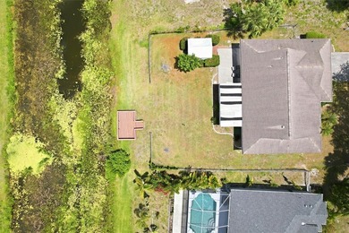 Tucked into a quiet North Port neighborhood, this well loved and - photo 4