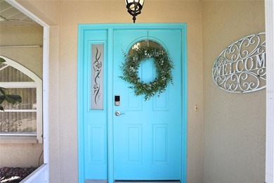 Tucked into a quiet North Port neighborhood, this well loved and - photo 6