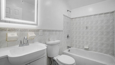 Newly Renovated Brick Two-Family House located within a block - photo 15