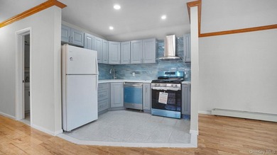 Newly Renovated Brick Two-Family House located within a block - photo 18