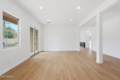 Welcome to 9350 S 182nd Ln, a stunning fully remodeled residence - photo 9