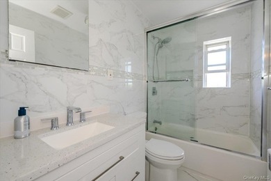 Welcome to 2368 Woodhull Avenue, located in the heart of the - photo 18