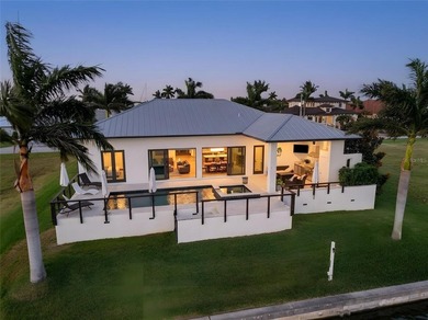 PUNTA GORDA ISLES | LAKEFRONT LUXURY | SUNSET VIEWS This - photo 2