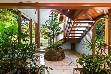 Tucked away in lush Wainiha Valley, this private North Shore - photo 3