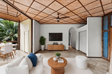 Tucked away in lush Wainiha Valley, this private North Shore - photo 5