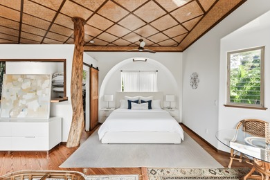 Tucked away in lush Wainiha Valley, this private North Shore - photo 9