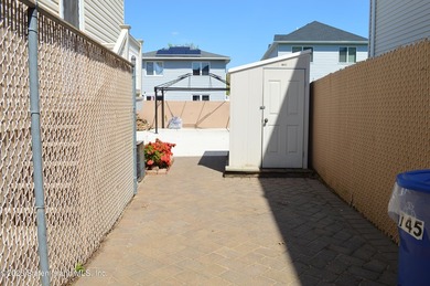 Welcome to this well maintained, fully detached 2-family home in - photo 25