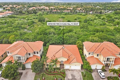 ONE-STORY HOME WITH A 3-CAR GARAGE IN THE EXCLUSIVE CUTLER CAY - photo 2